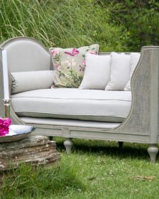 What to do on a staycation. Glamorous sofa seating in a garden.