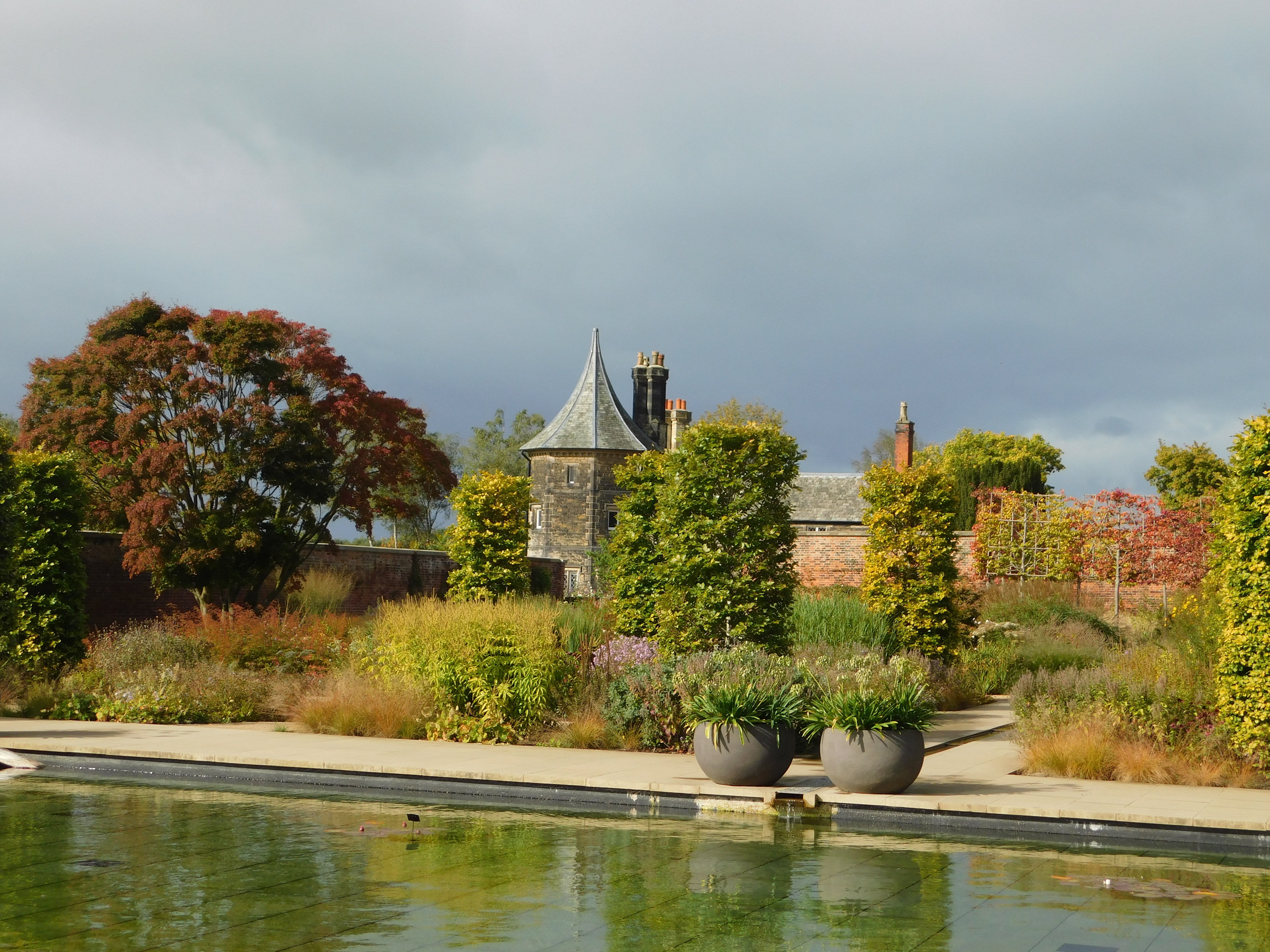 Visit RHS Bridgewater Gardens. Looking across to the Head Gardeners Cottage.